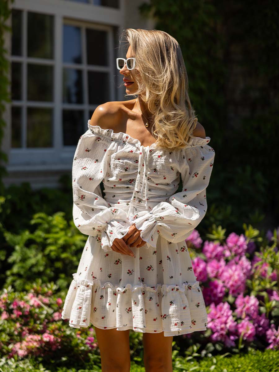 White muslin mini dress with flowery print