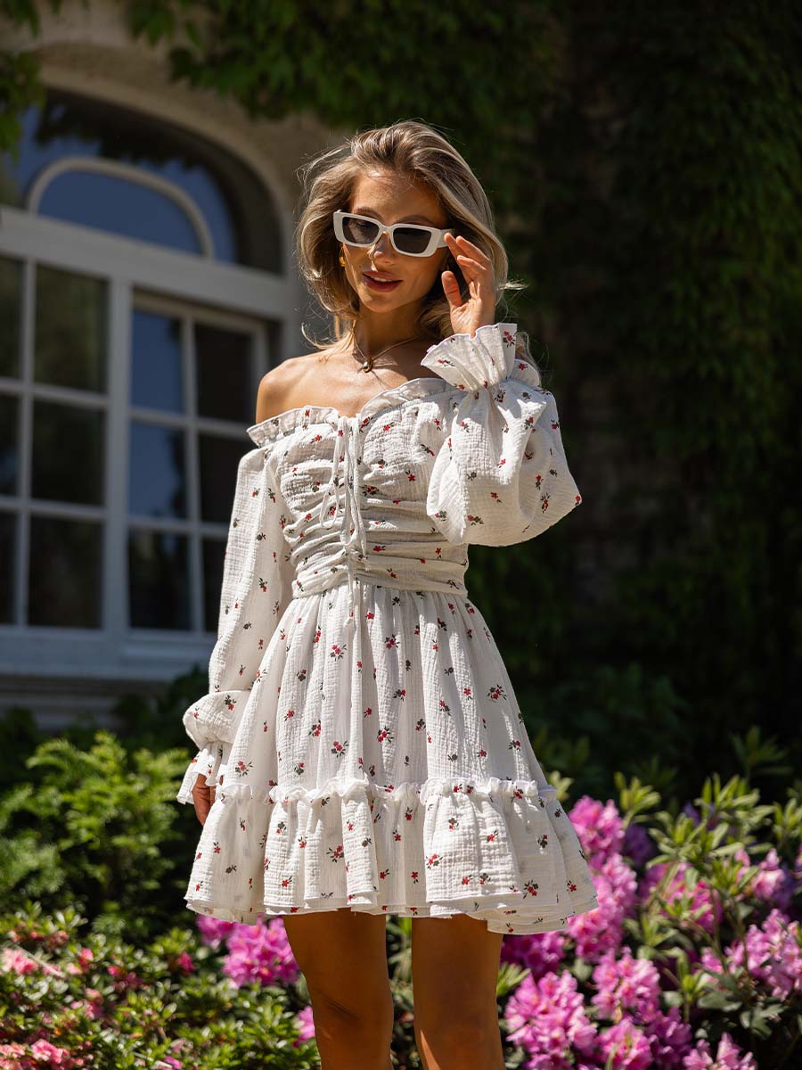 White muslin mini dress with flowery print