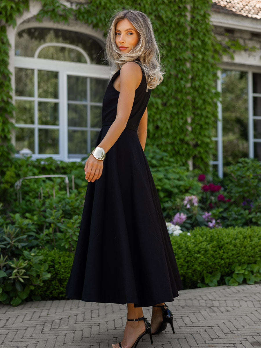 Black midi dress with a belt