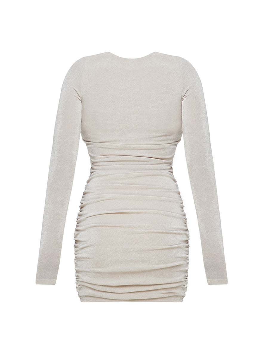 Dress of beige color with drapery