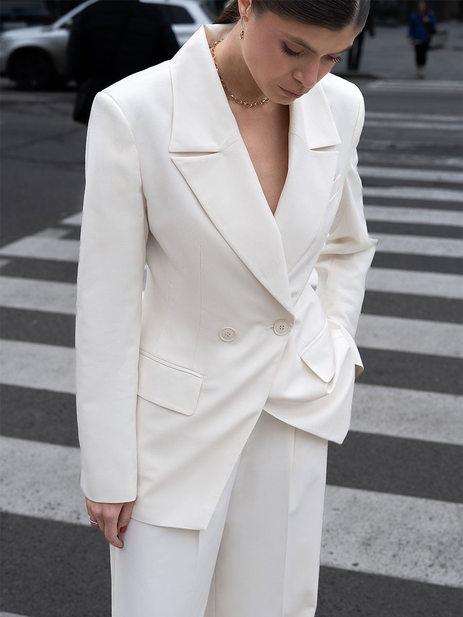 Double-breasted milk-colored jacket
