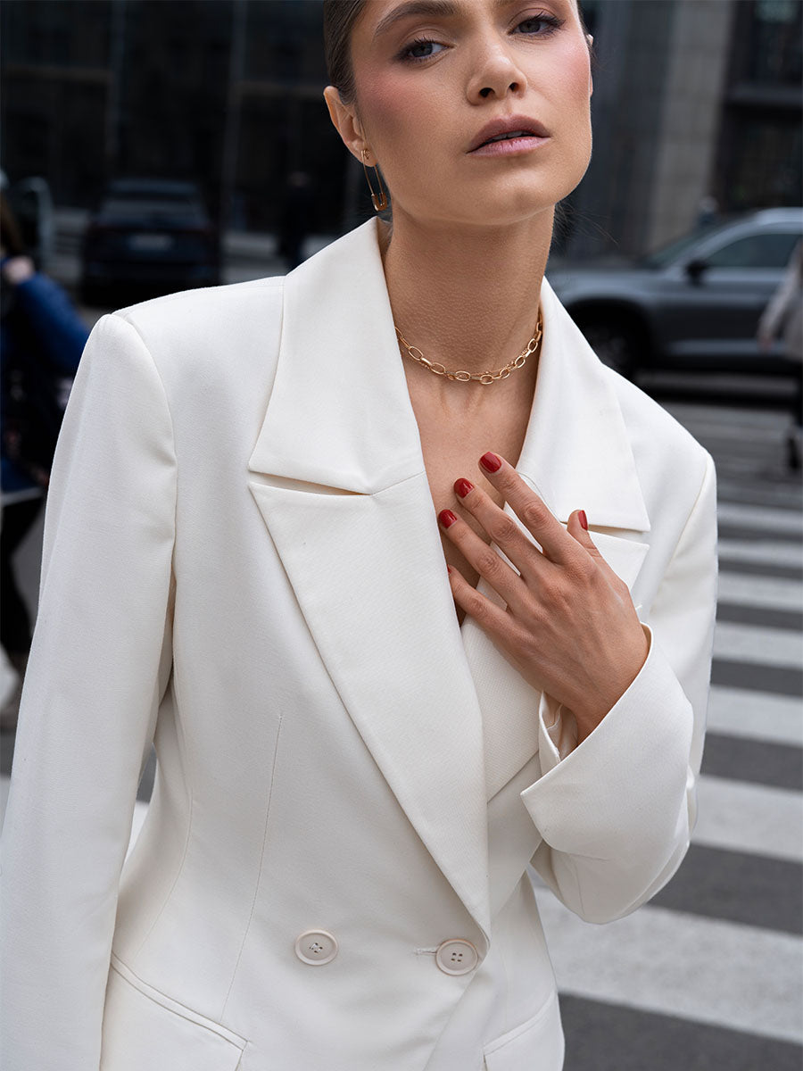 Double-breasted milk-colored jacket