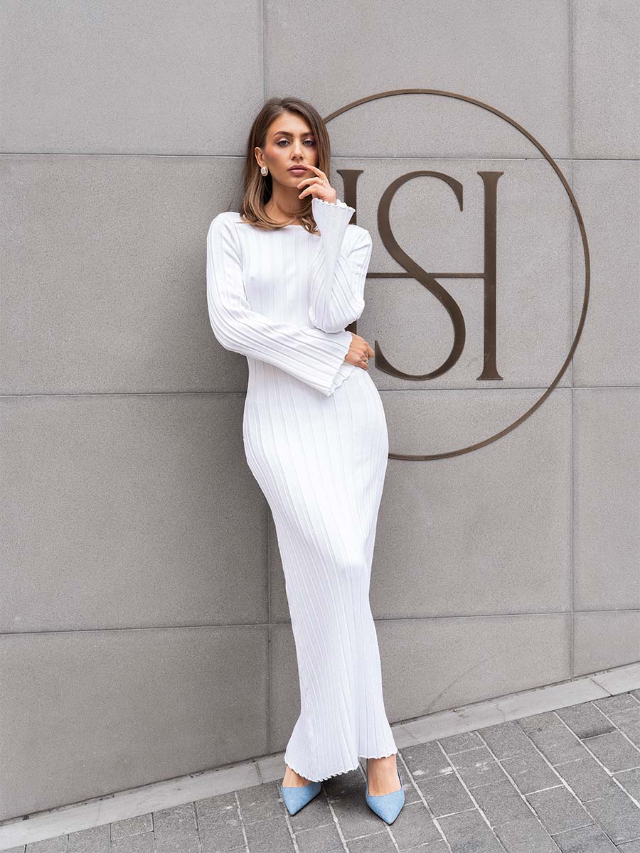 White knitted midi dress with a cutout on the back