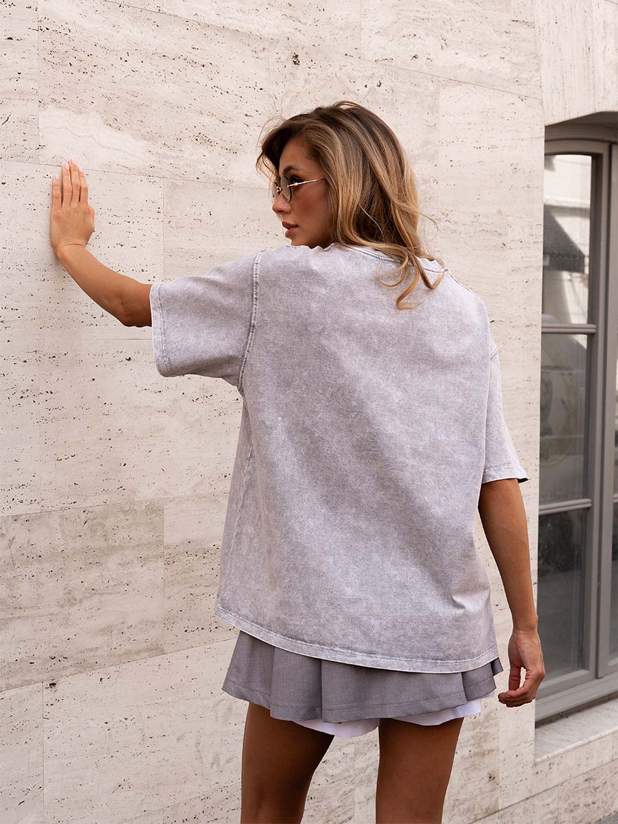 T-shirt cooked in gray color with Act now print