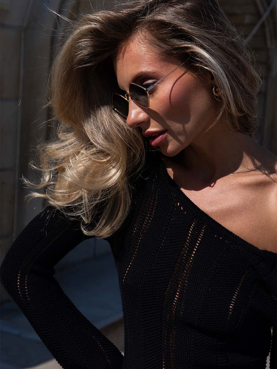 Black knitted maxi dress with a cutout on the back