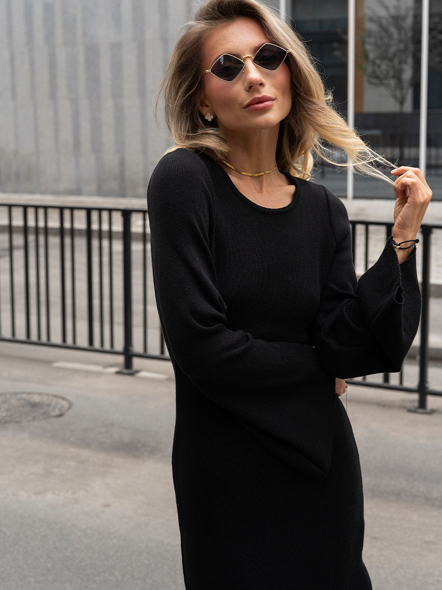 Black knitted midi dress with an open back