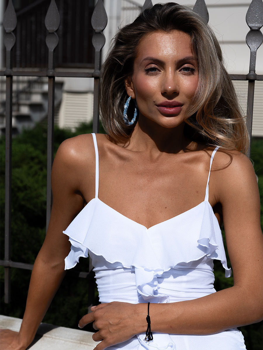 White mini dress with ruffles
