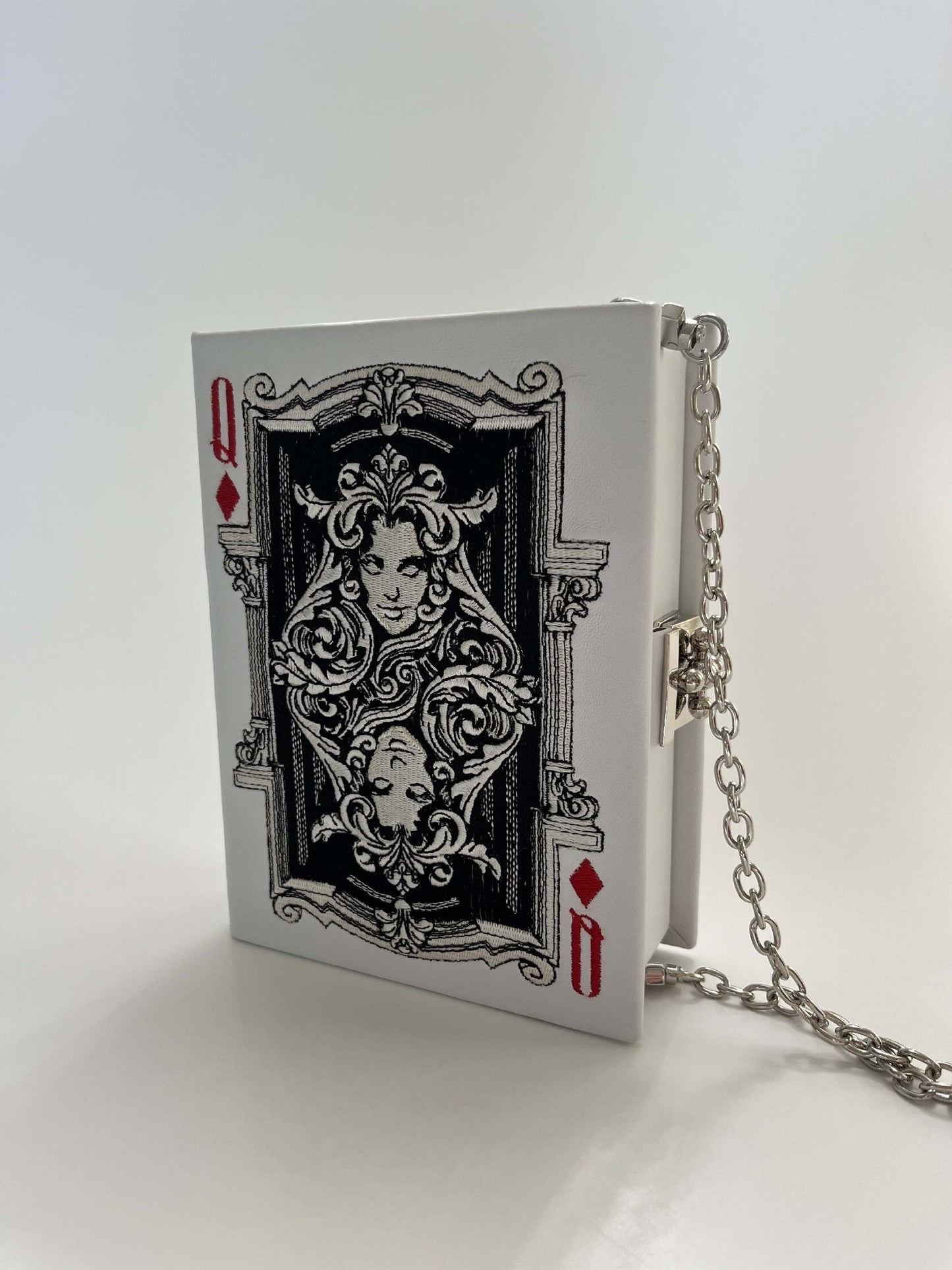 Embroidered clutch Playing card