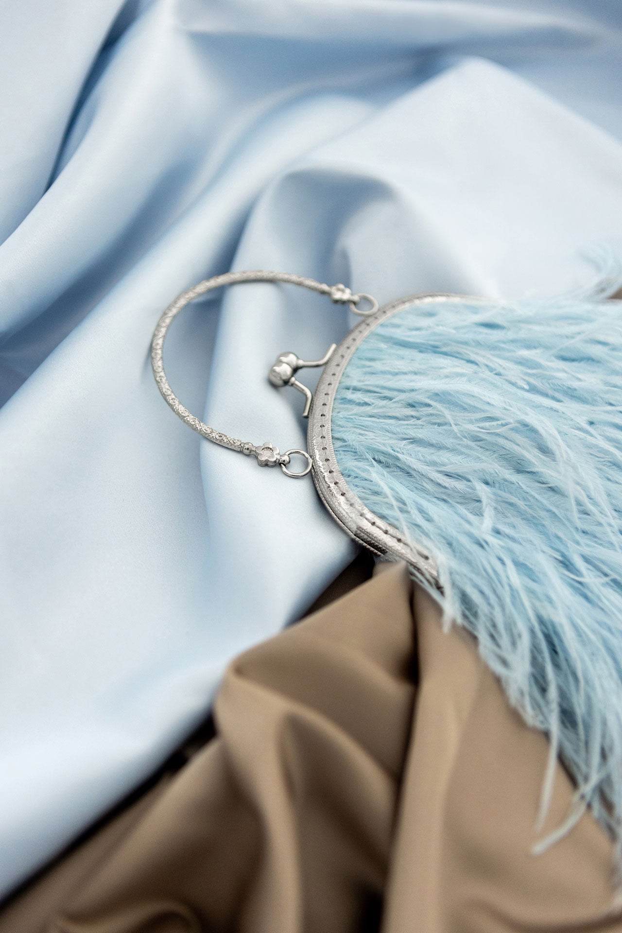 Blue bag with a flowers decorated handle