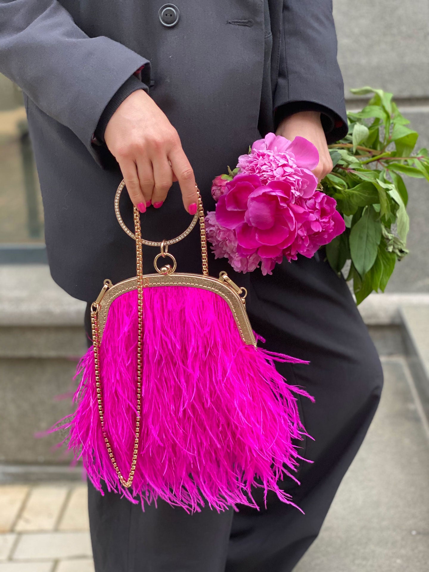 Fucsia bag with a crystal decorated handle