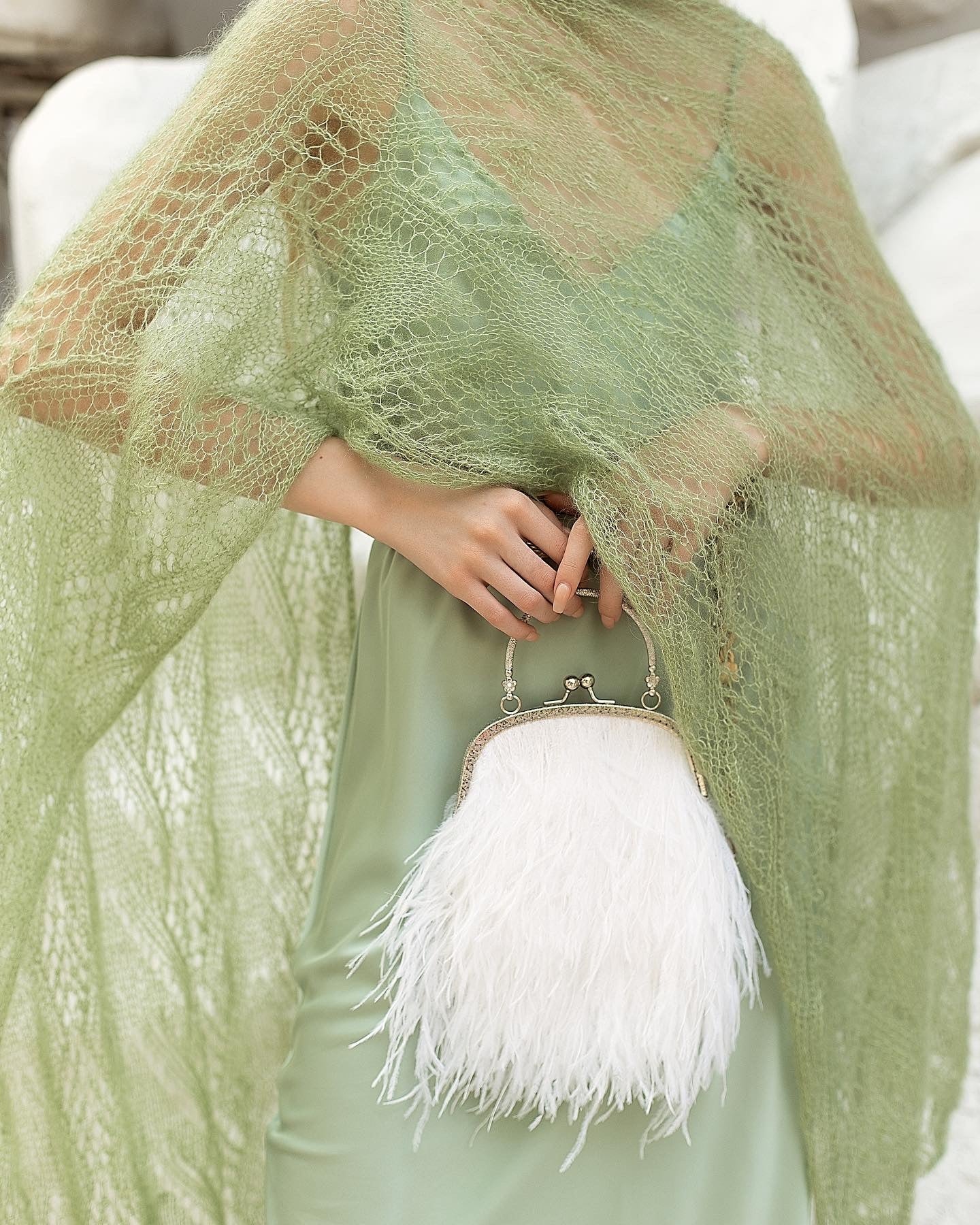 White bag with a flower decorated handle