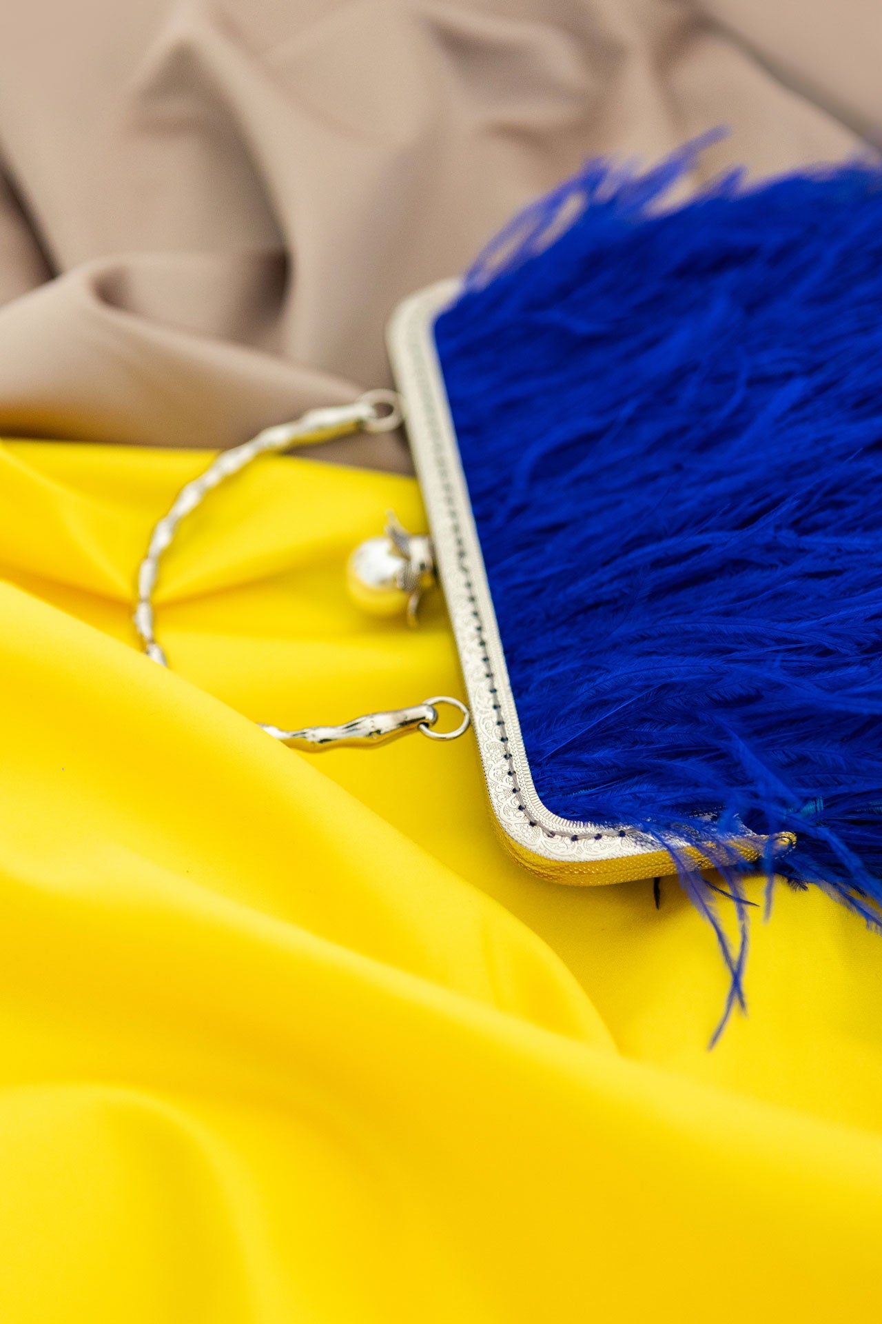 Blue bag with a pearl decorated handle