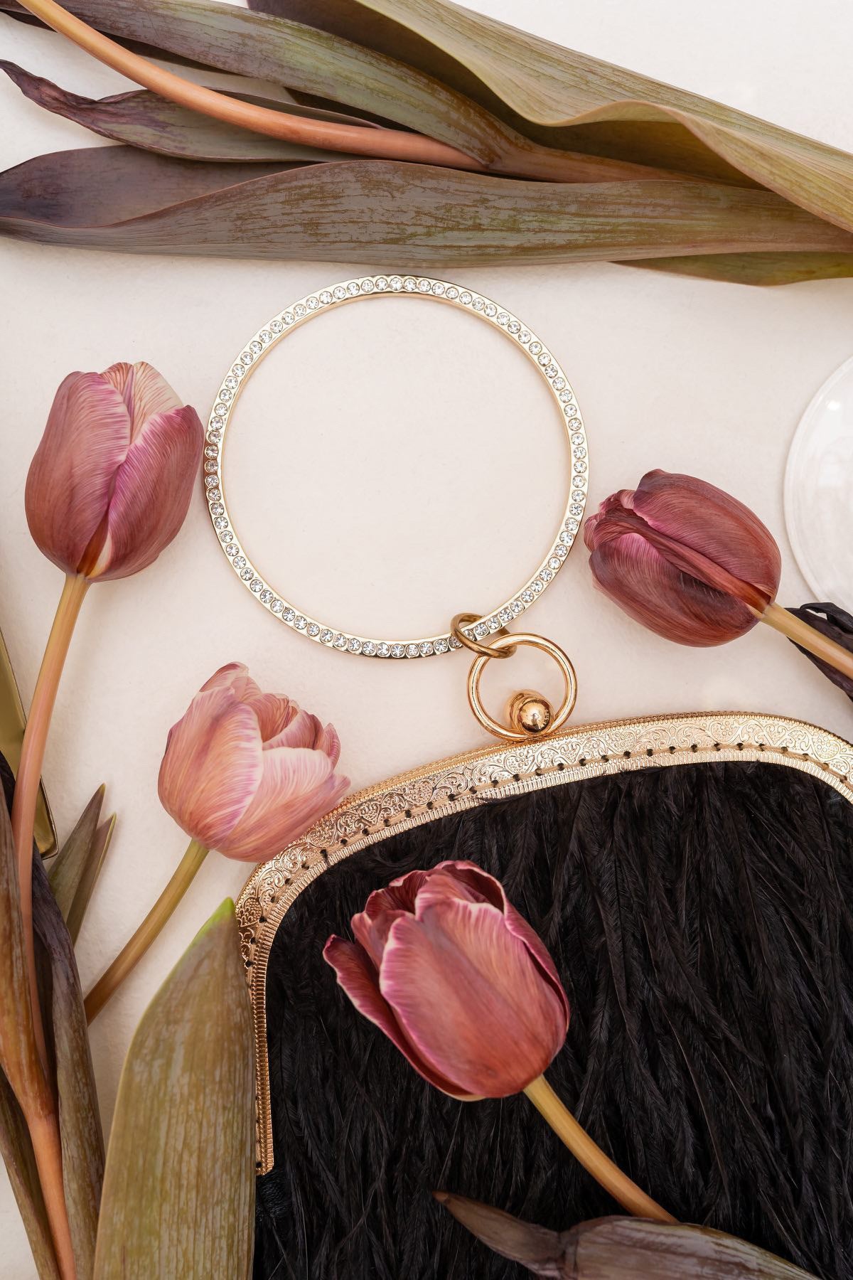 Black bag with a crystal decorated handle