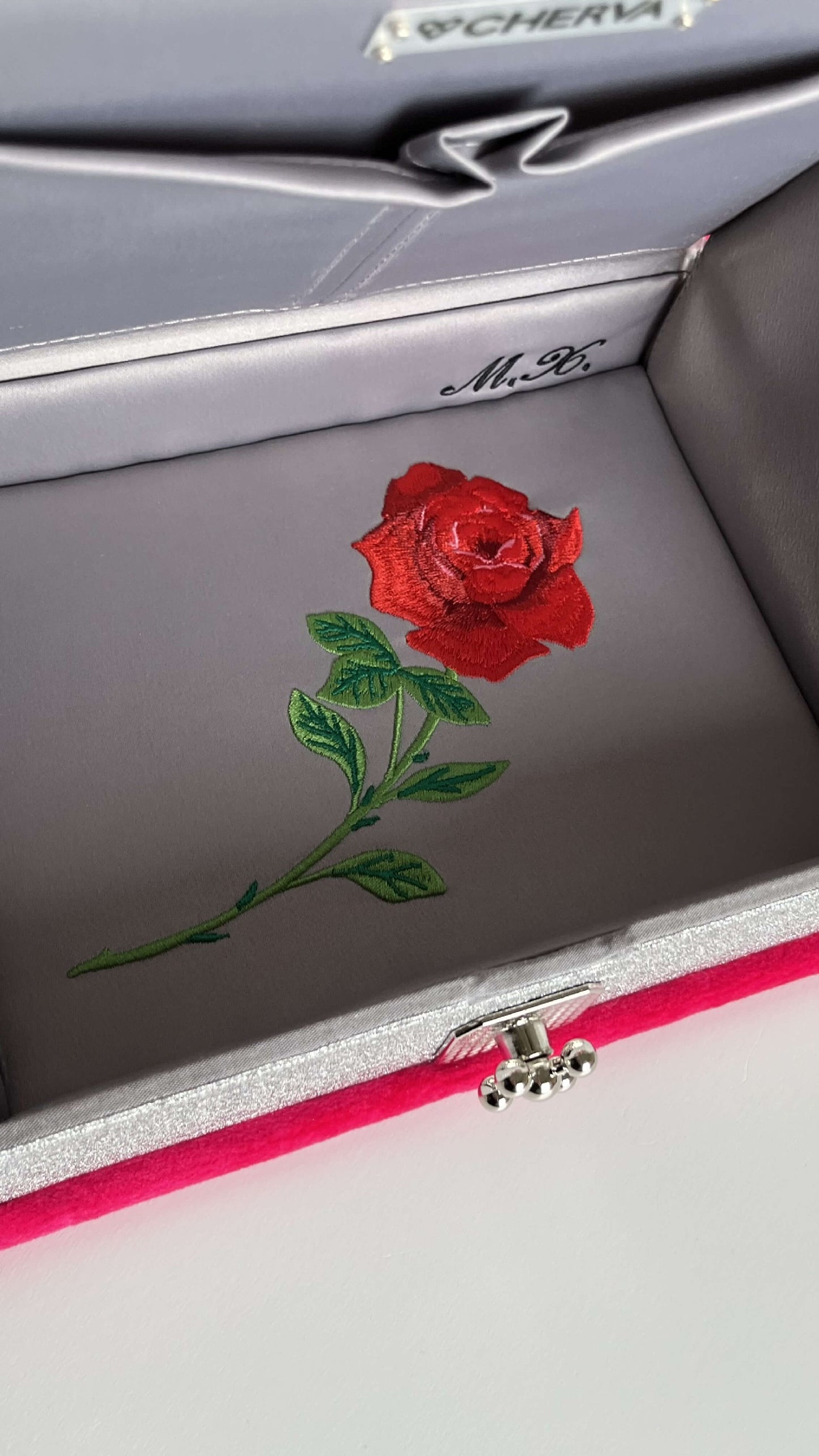Embroidered clutch Love