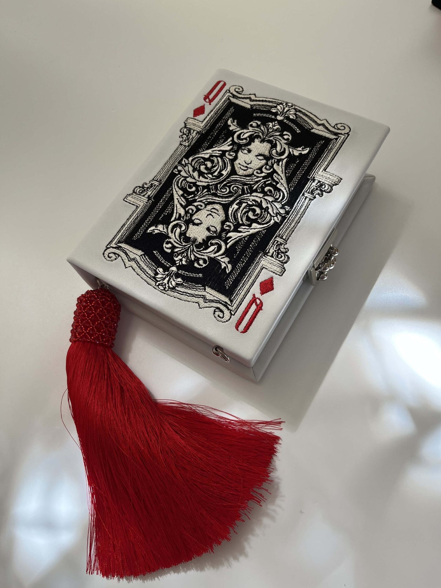 Embroidered clutch Playing card