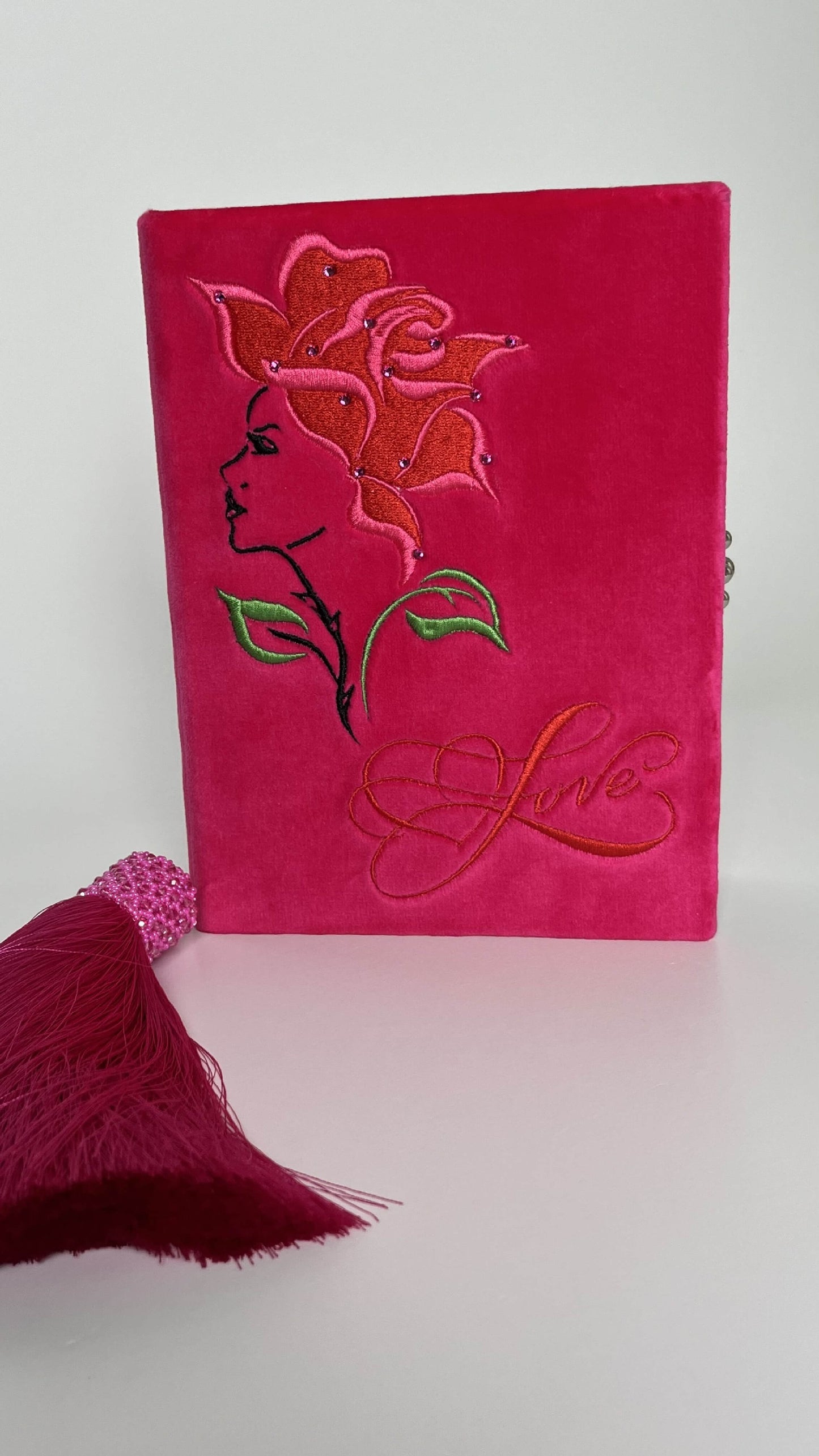 Embroidered clutch Love