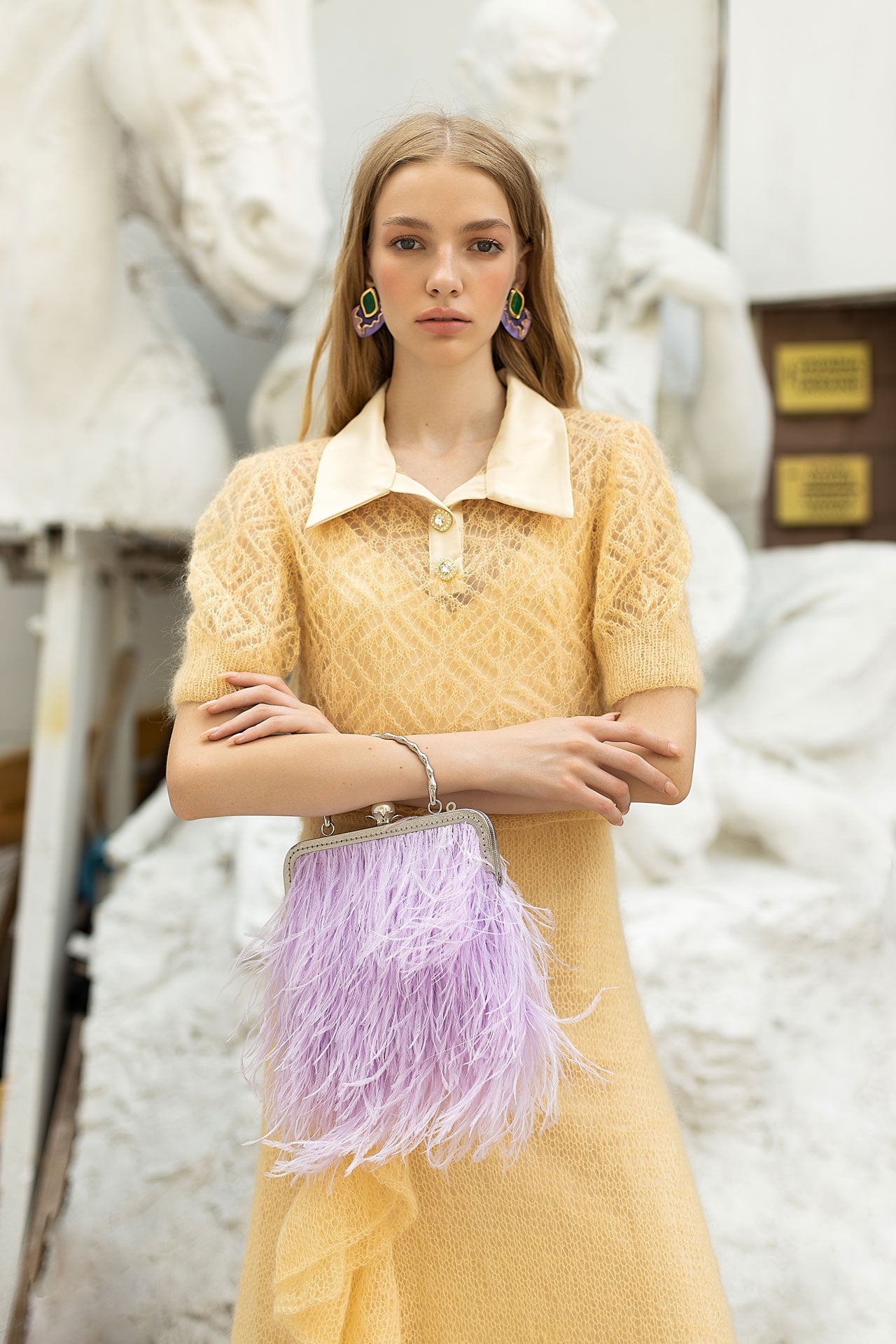 Lilac bag with a pearl decorated handle