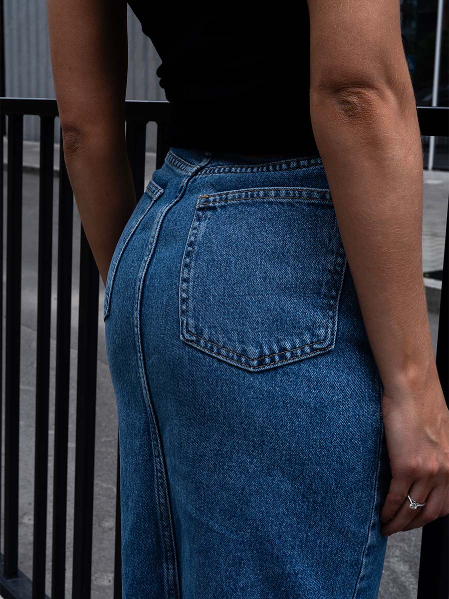 Blue denim midi skirt with a slit