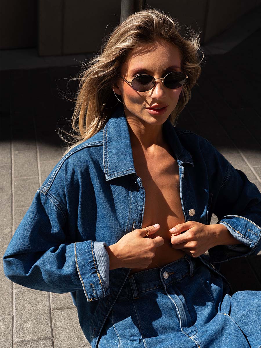 Oversized blue denim shirt with a pocket