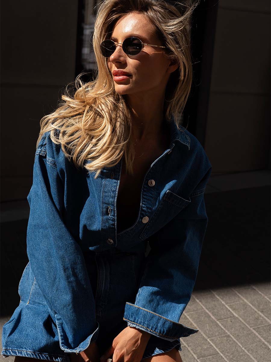Oversized blue denim shirt with a pocket