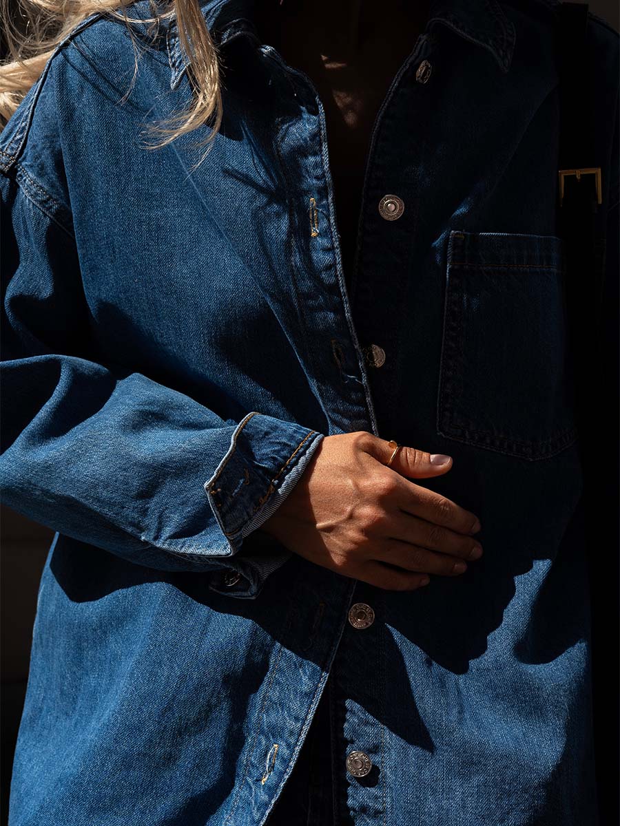 Oversized blue denim shirt with a pocket