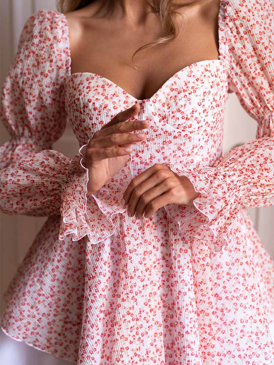 Milk-colored mini corset dress with a red flower