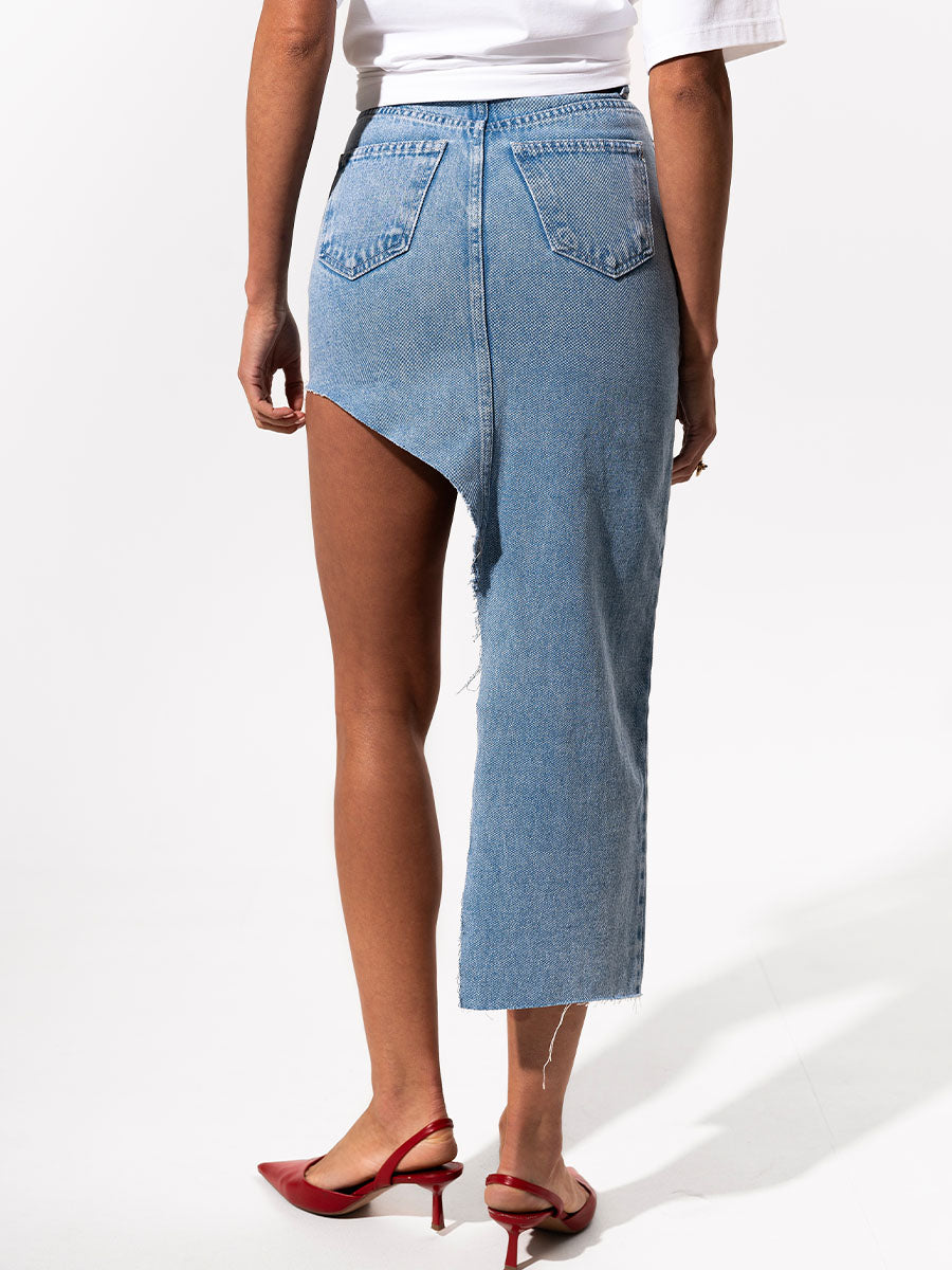 Midi denim skirt of light blue color with a cutout