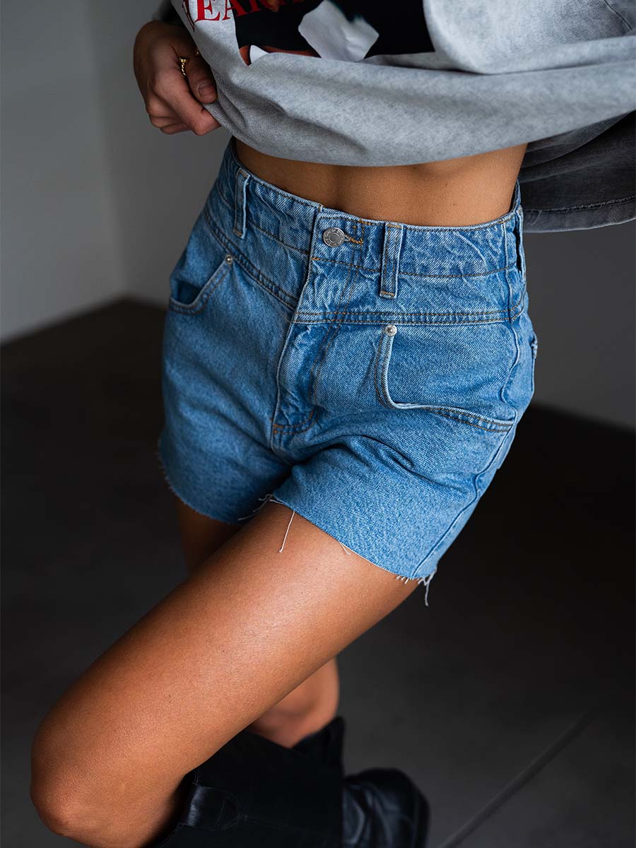 Blue shorts with raw bottom