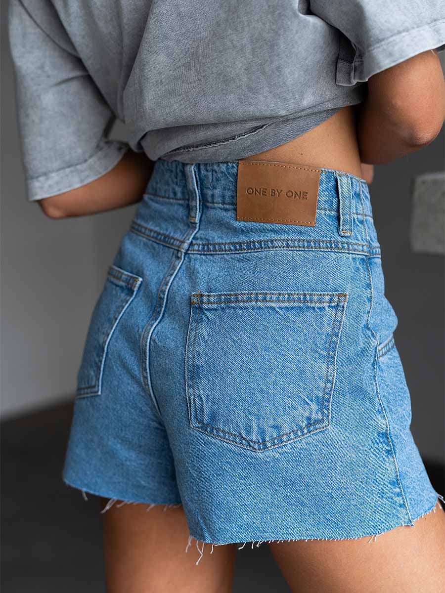 Blue shorts with raw bottom