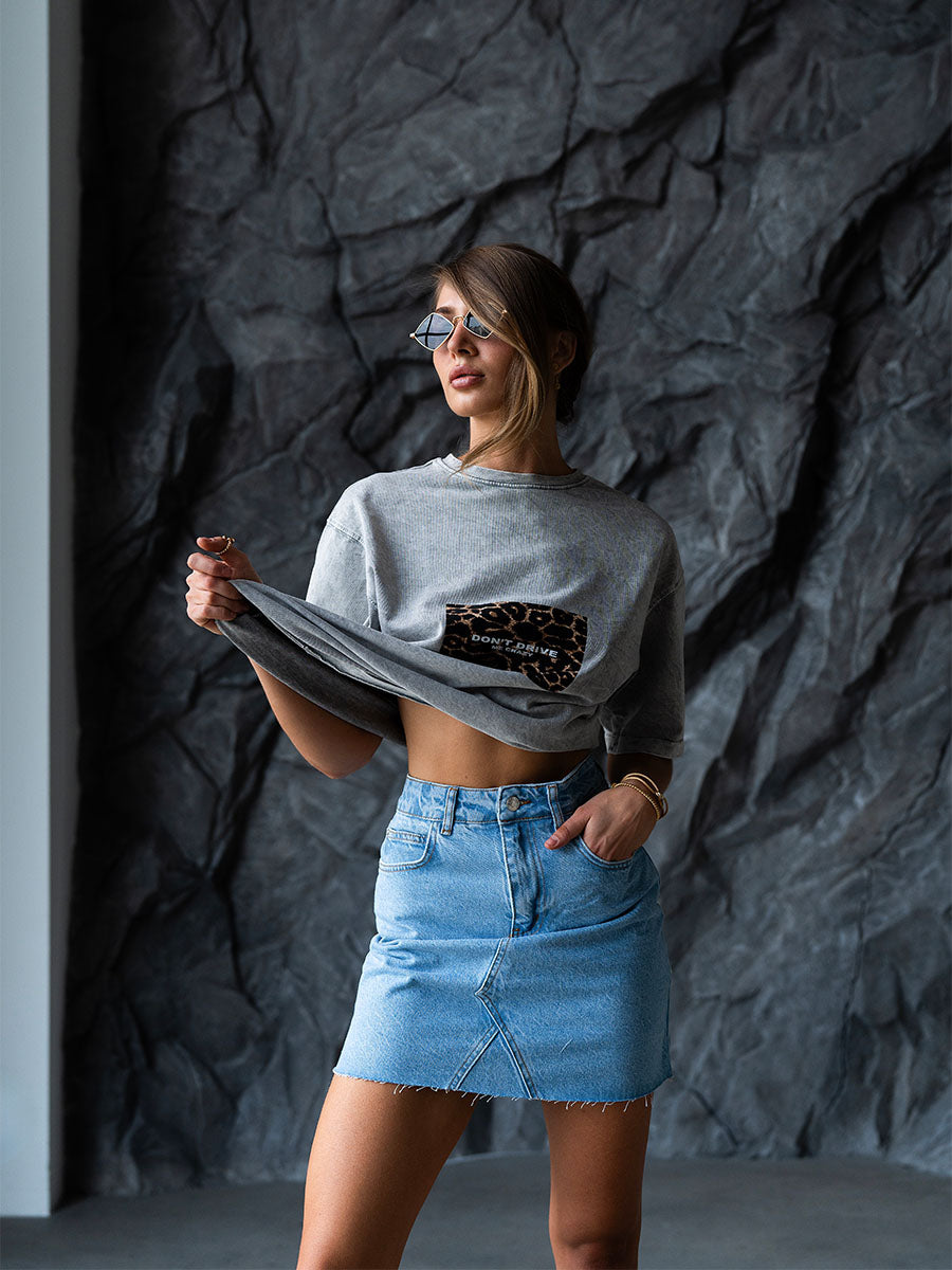 Light blue denim mini skirt