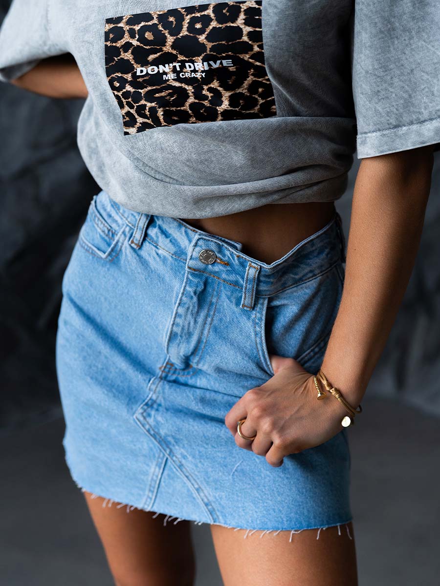 Light blue denim mini skirt
