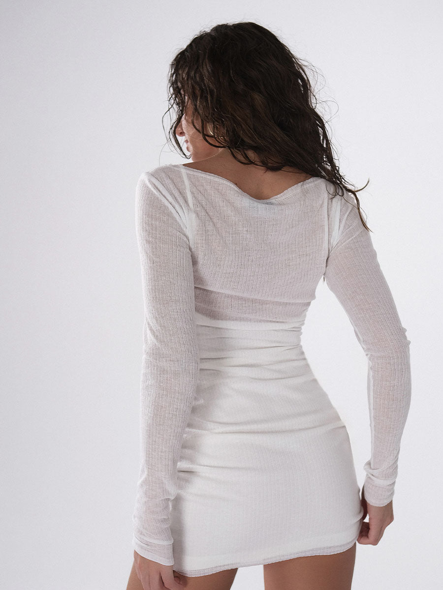 White mini dress with long sleeves
