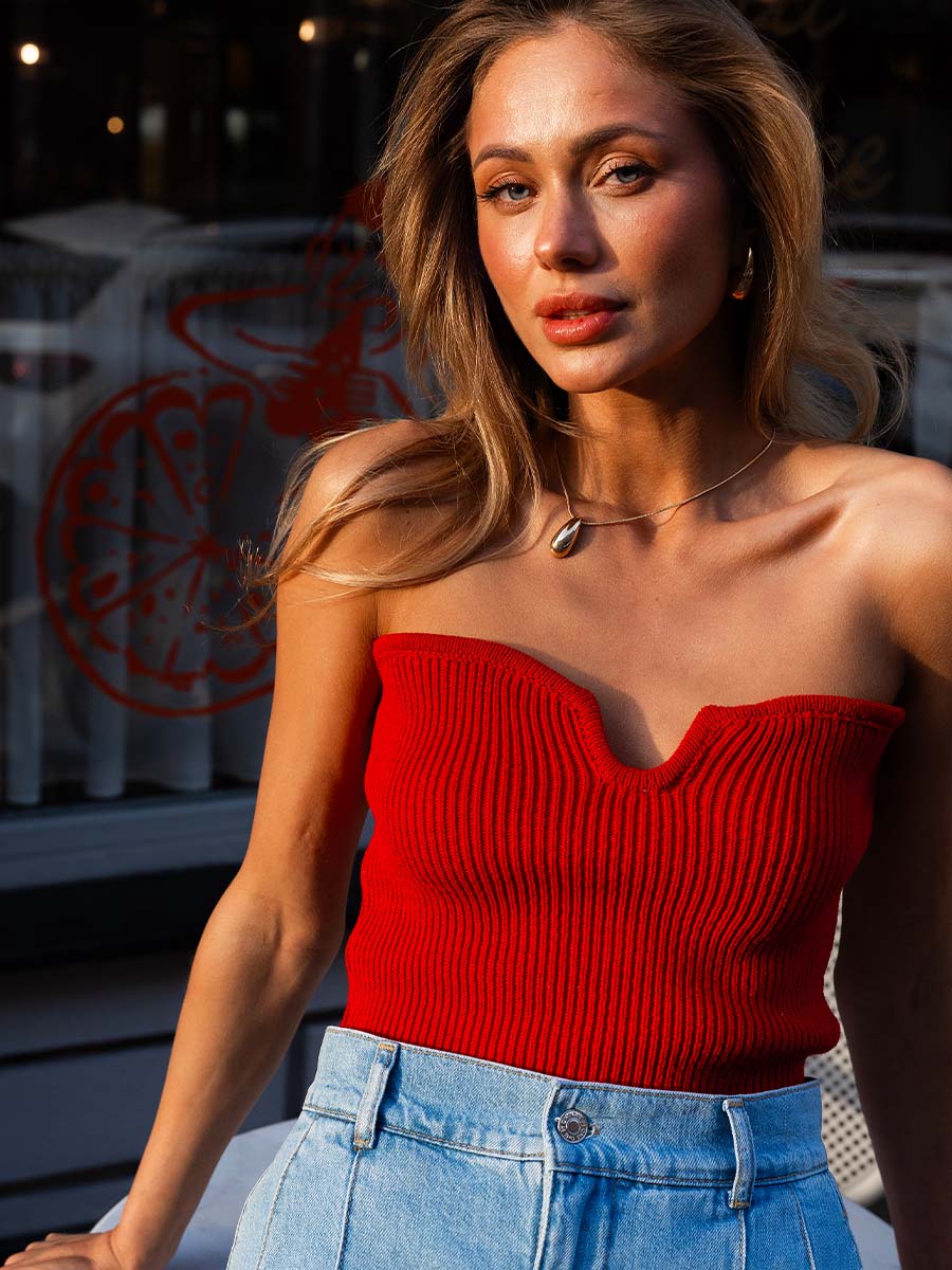 Red knitted top with open shoulders