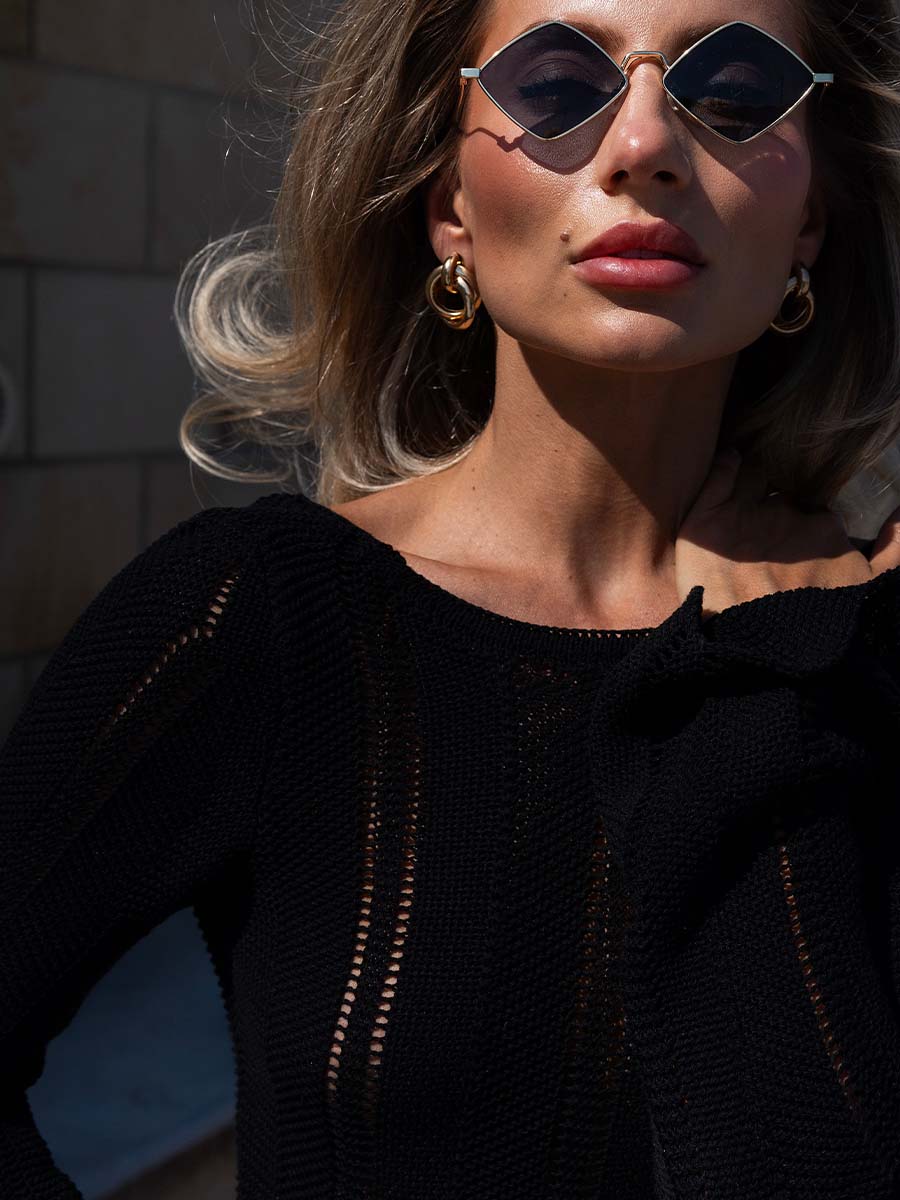 Black knitted maxi dress with a cutout on the back