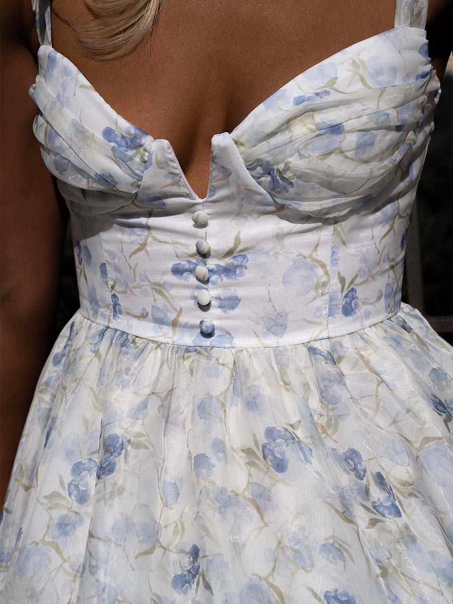 Milk-colored mini dress corseted in blue flowers
