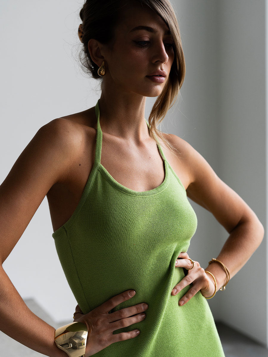 Light green midi knitted dress with ties on the neck