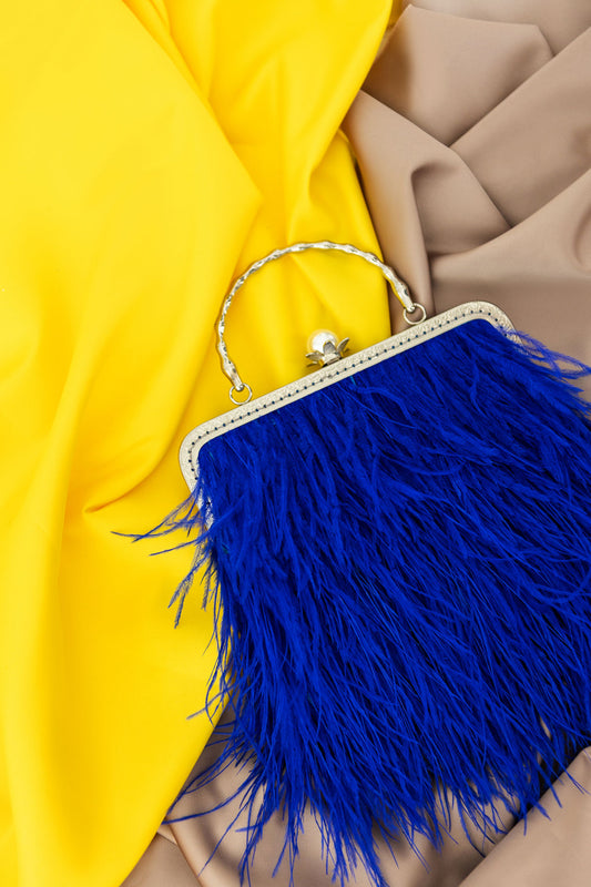 Blue bag with a pearl decorated handle