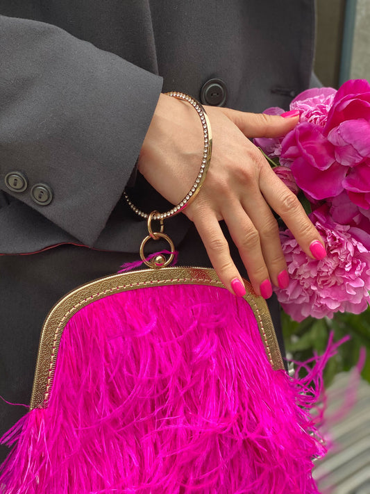 Fucsia bag with a crystal decorated handle