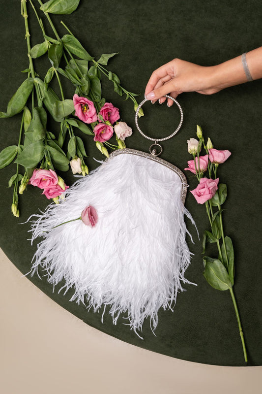 White bag with a crystal ring handle