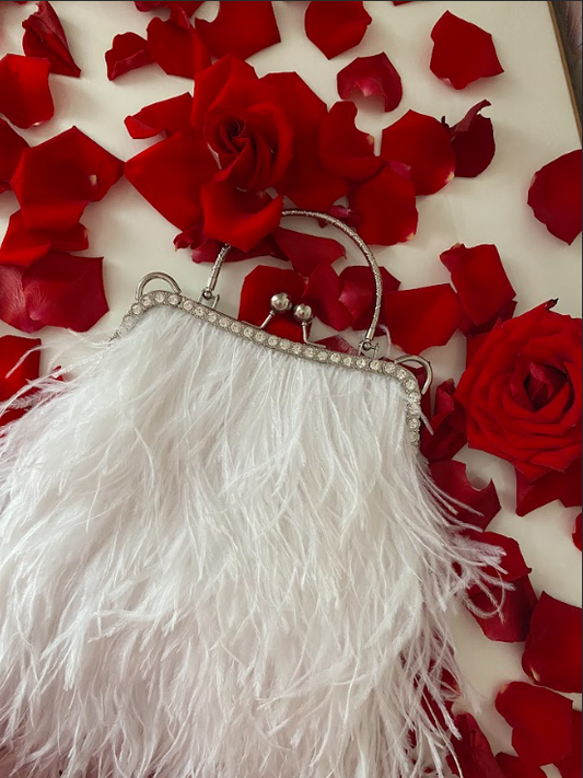 White bag with a crystal decorated handle