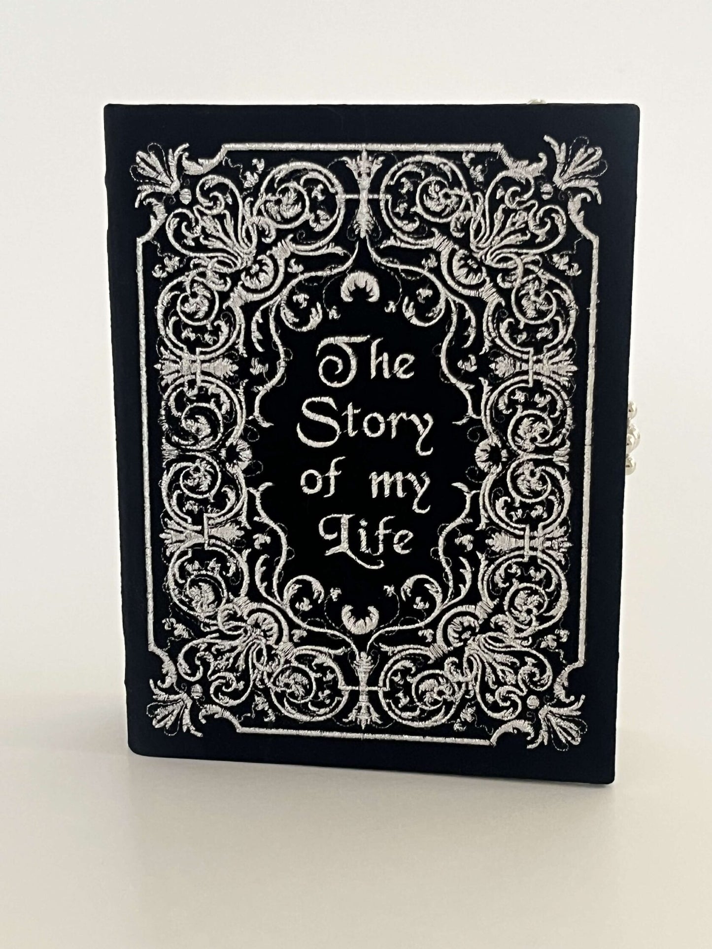 Embroidered clutch The story of my life