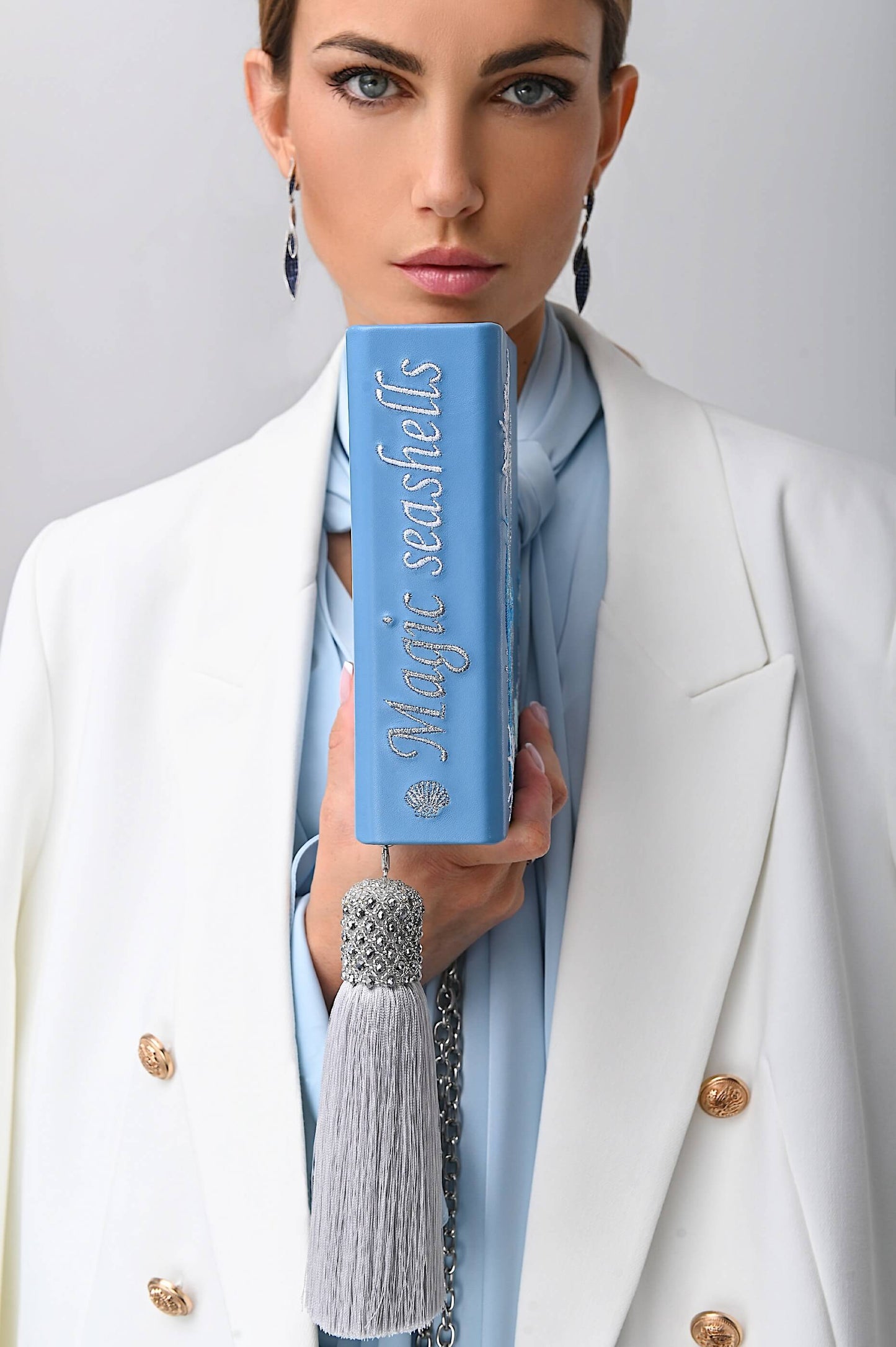 Embroidered clutch Magic shell blue