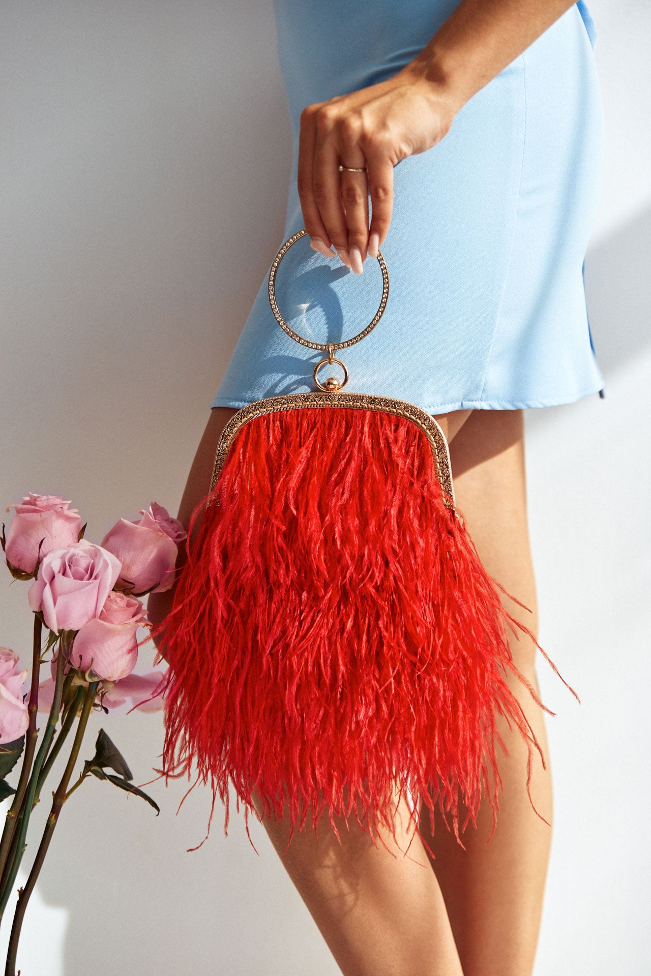 Red bag with a crystal decorated handle