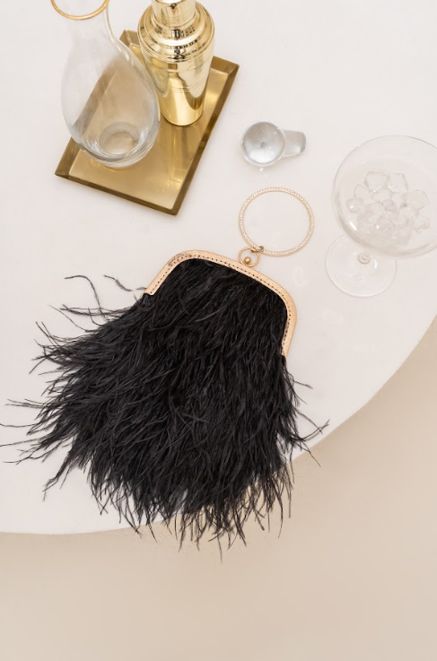 Black bag with a crystal decorated handle