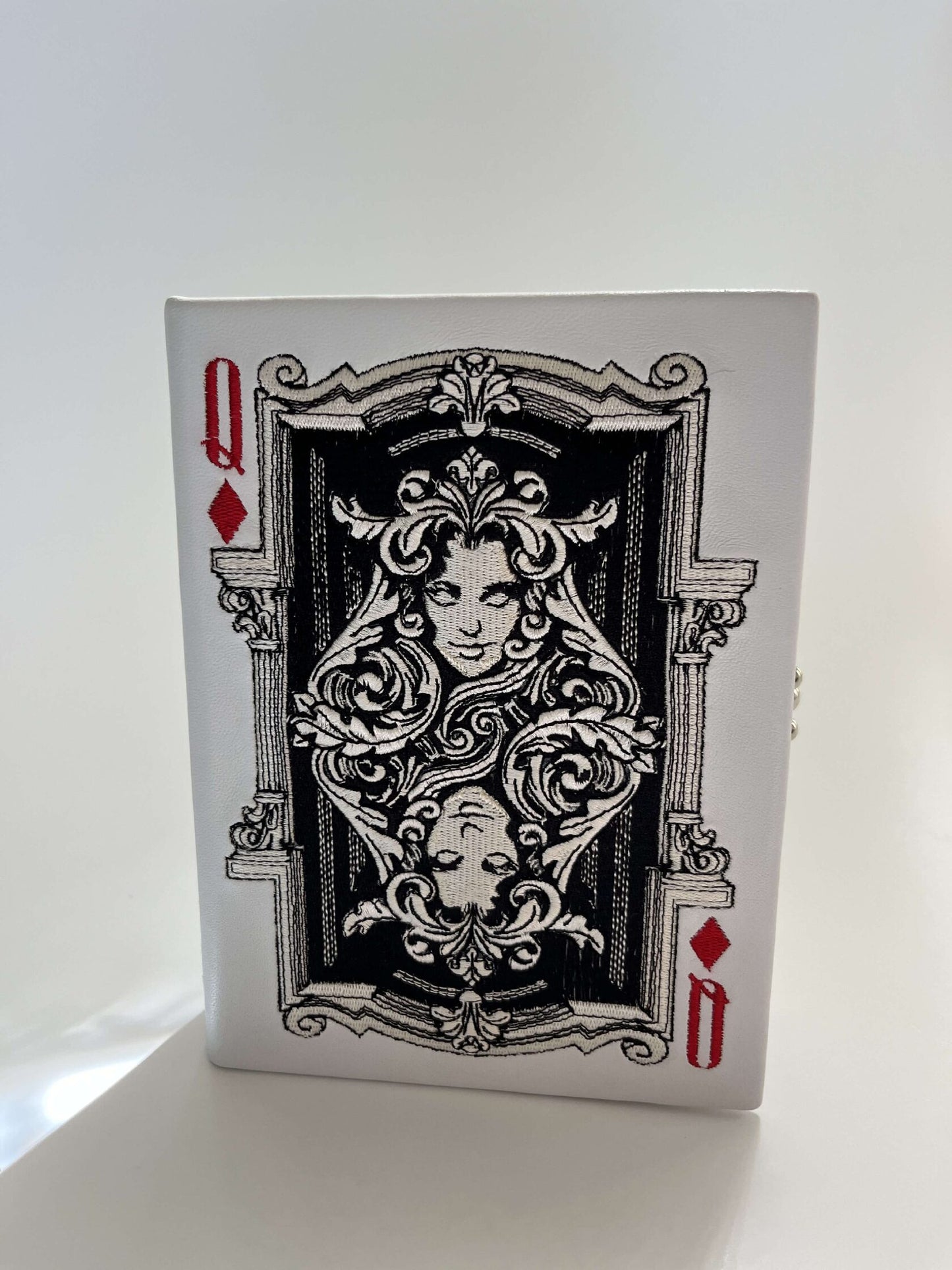Embroidered clutch Playing card