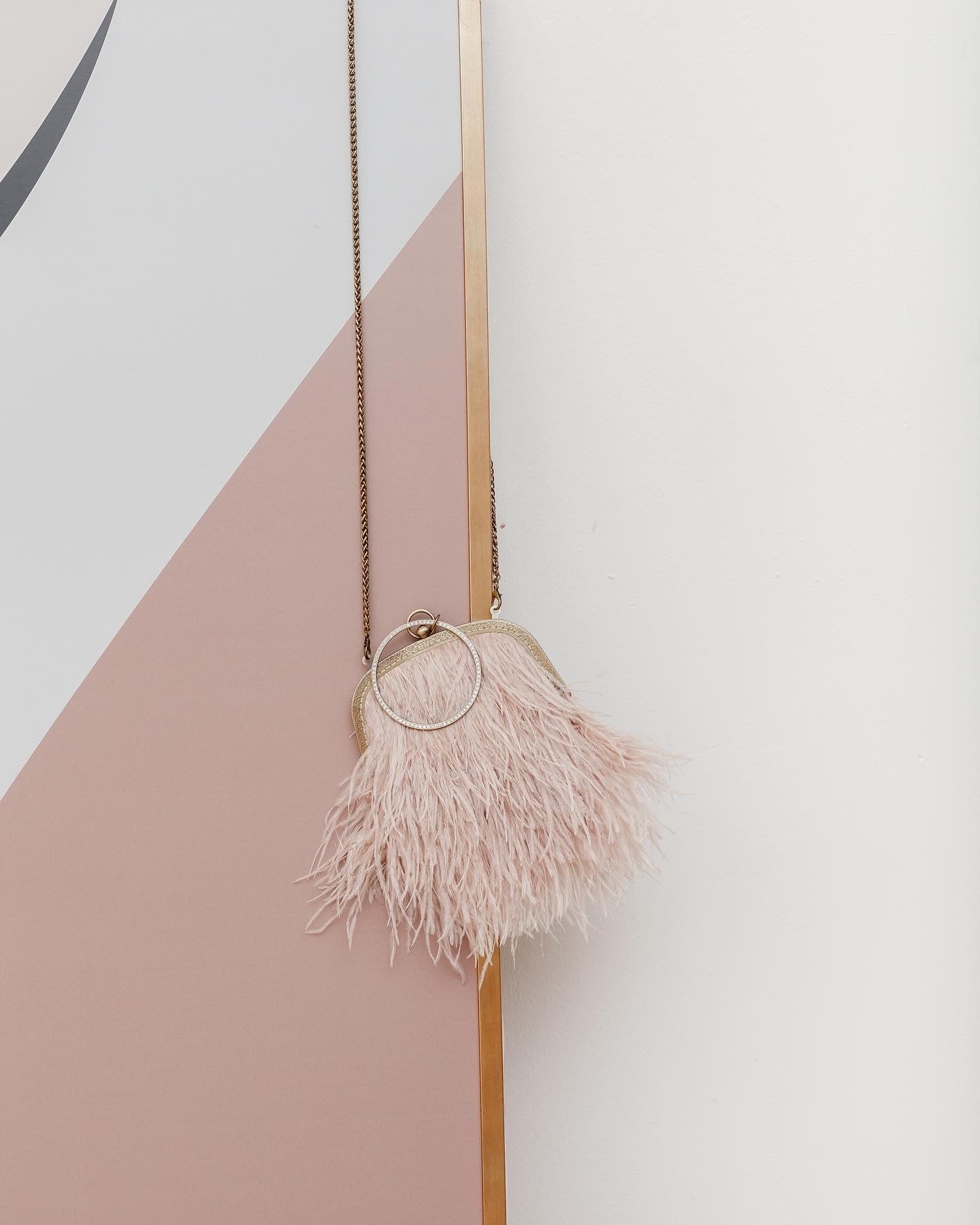 Powder bag with a crystal decorated handle