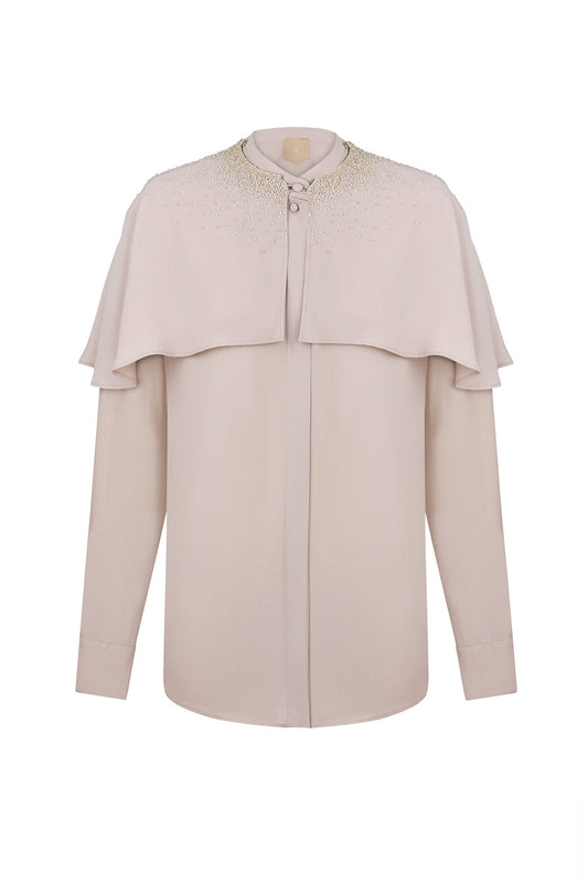 Beige blouse with decoration