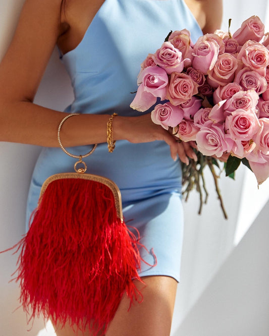 Red bag with a crystal decorated handle