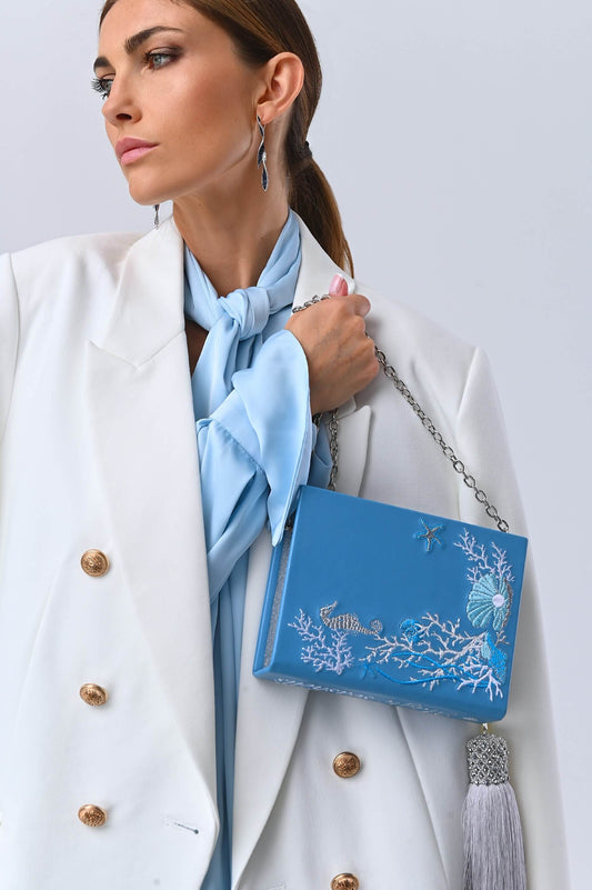 Embroidered clutch Magic shell blue