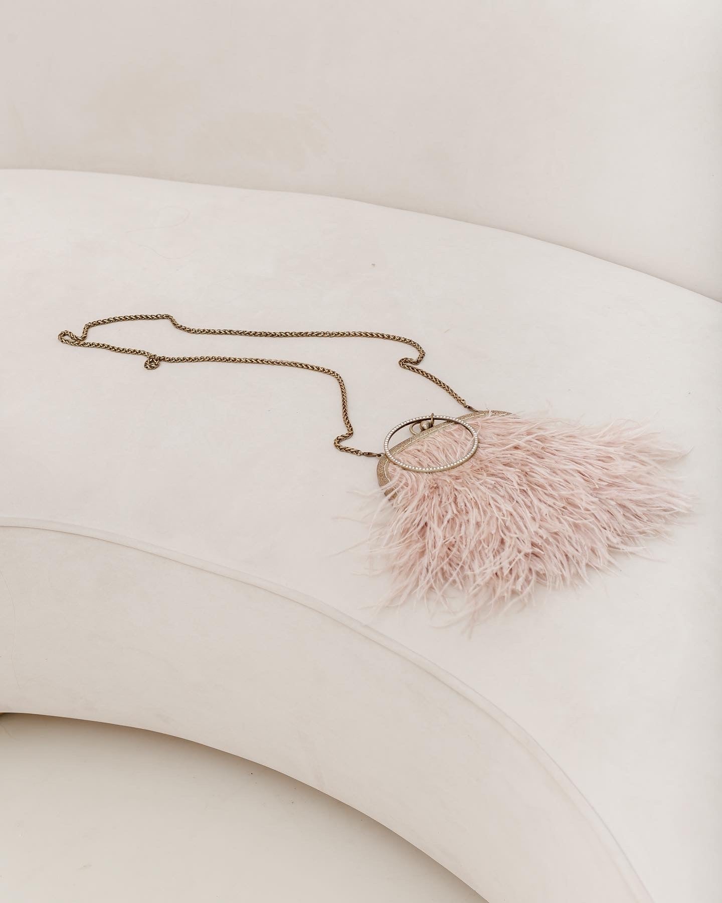 Powder bag with a crystal decorated handle